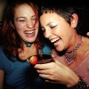 2 women laughing